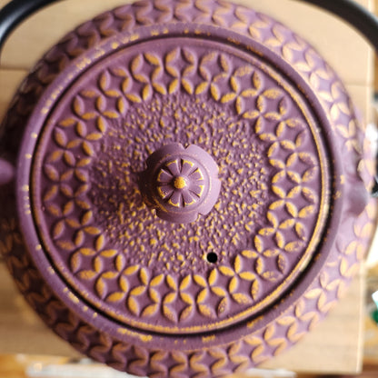 Close up of purple teapot lid